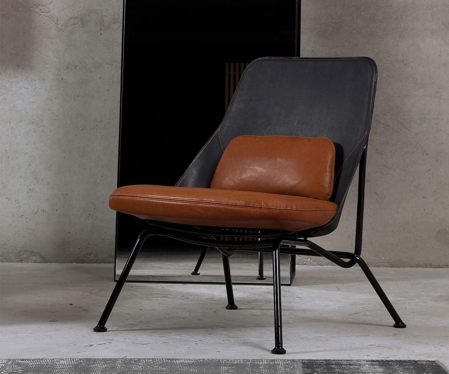 Prostoria Design Sessel Strain mit Sitzfläche in Leder Cognac Prostoria Design Sessel Strain mit Sitzfläche in Leder Cognac