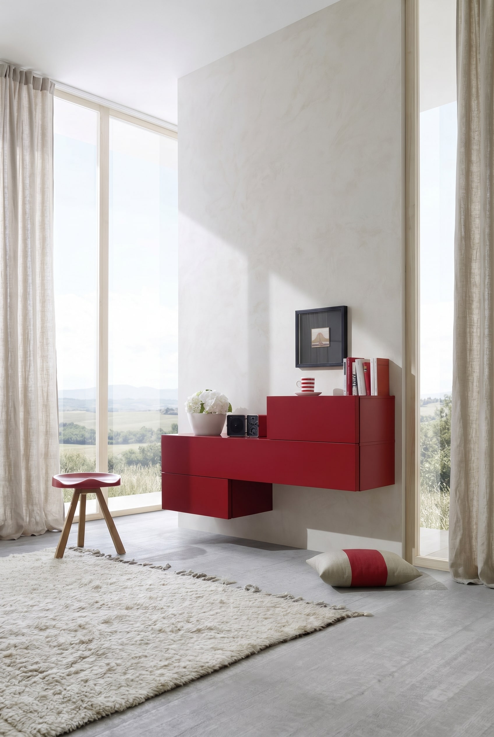 Ein asymmetrisch angeordnetes schwebendes Sideboard an einer minimalistischen weißen Wand im offenen Wohnbereich. Ein asymmetrisch angeordnetes schwebendes Sideboard an einer minimalistischen weißen Wand im offenen Wohnbereich.