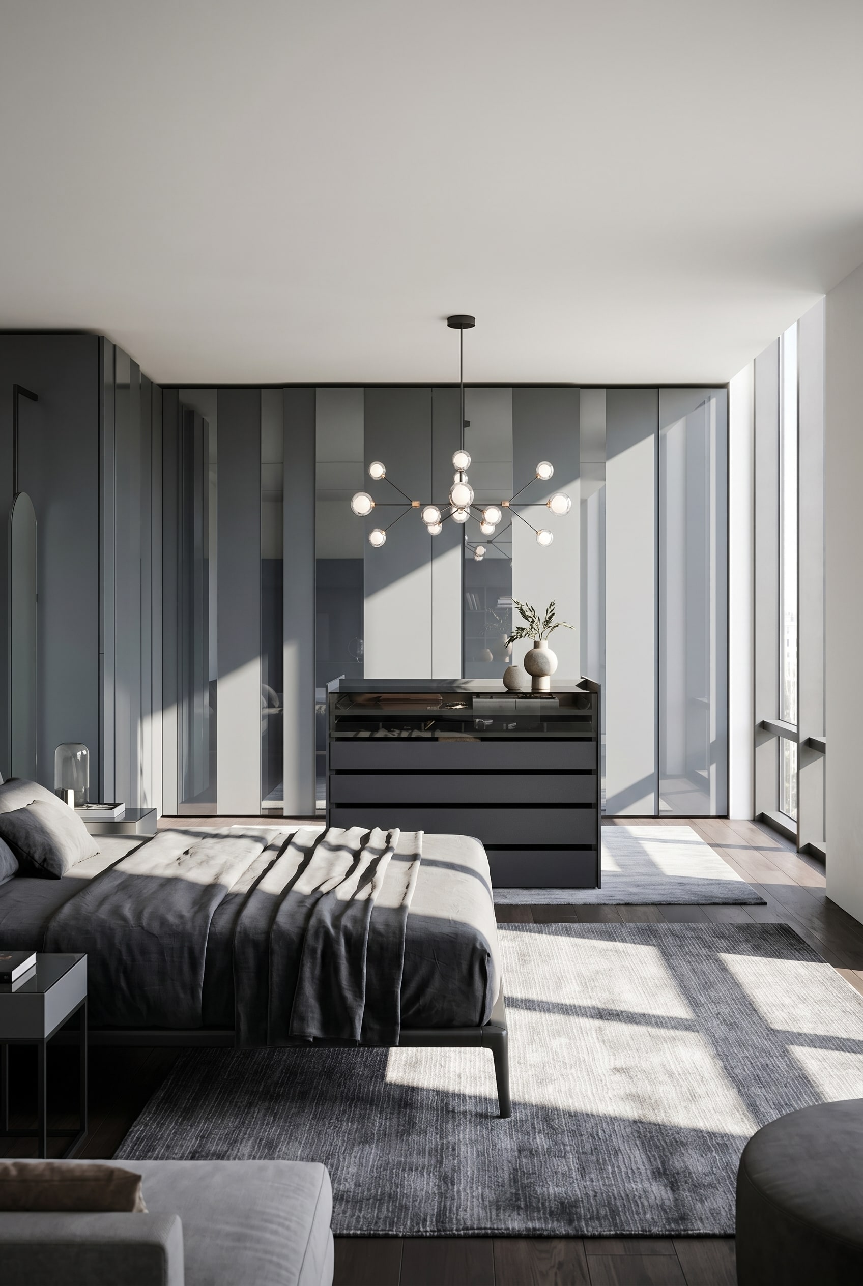 Elegant dark wardrobe island with glass cover and drawers in the middle of a bright dressing room with terrazzo flooring