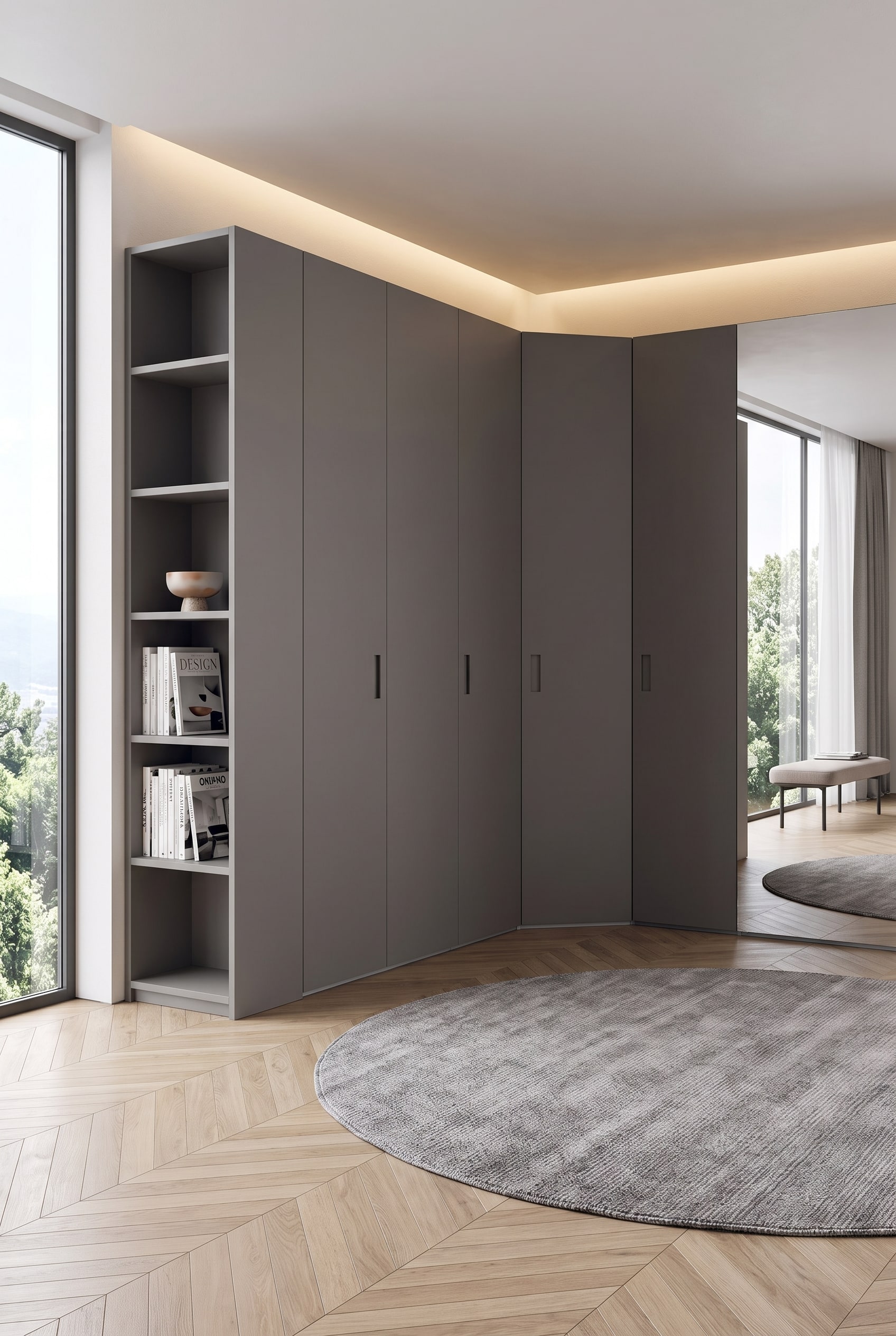 Modernes Ankleidezimmer mit L-f&ouml;rmigem Eckschrank in mattem Grau, integriertem offenem Regalteil und einem runden Teppich