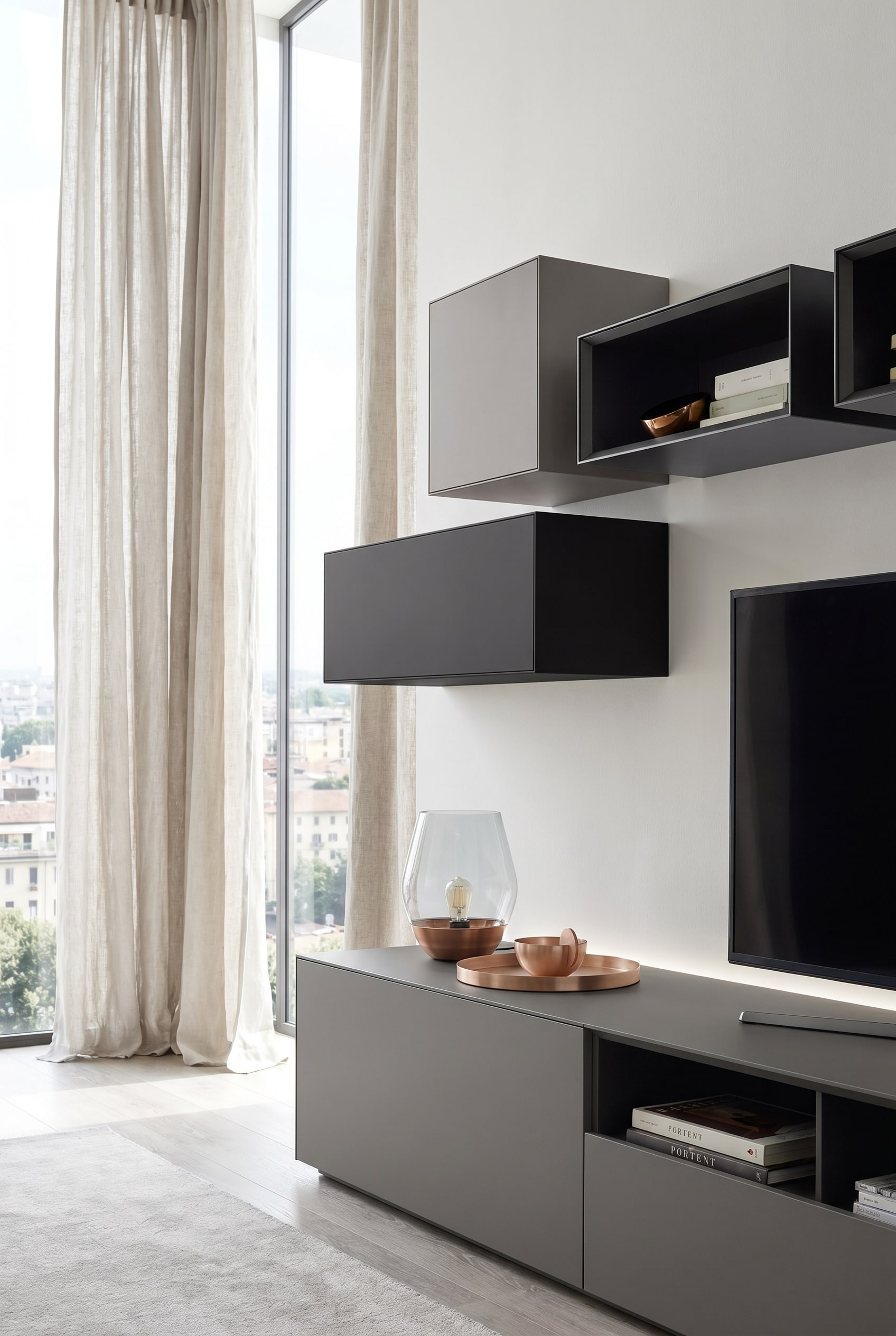 Modern living room with a minimalist lowboard and an asynchronously placed Livitalia Minimal wall cabinet in matte grey