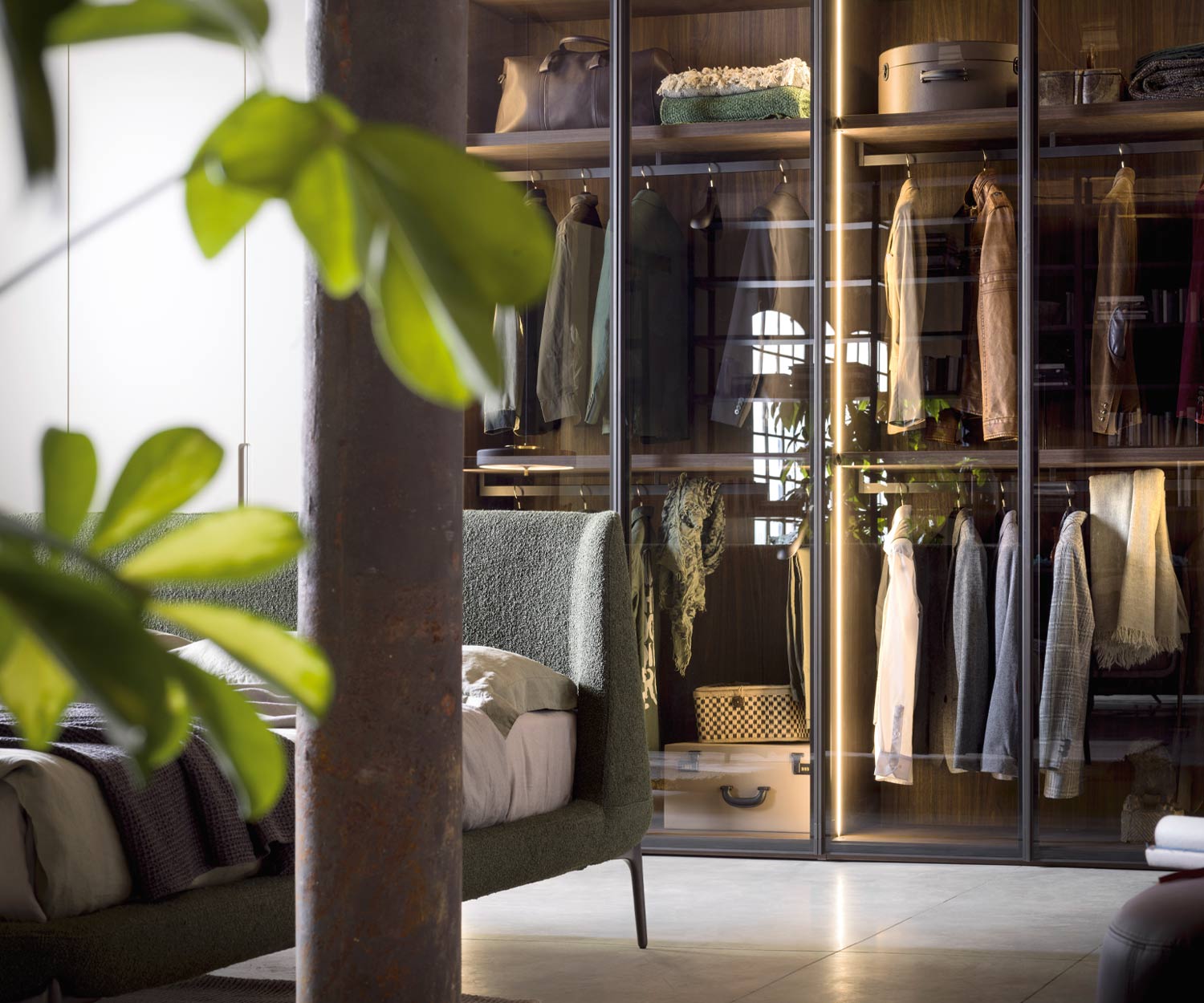 Glass door designer wardrobe Perry from Novamobili behind bed Glass door designer wardrobe Perry from Novamobili behind bed