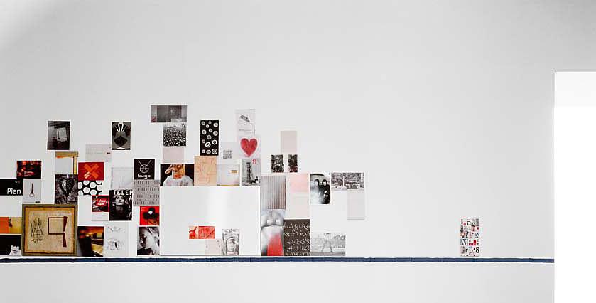 photo collage on white wall