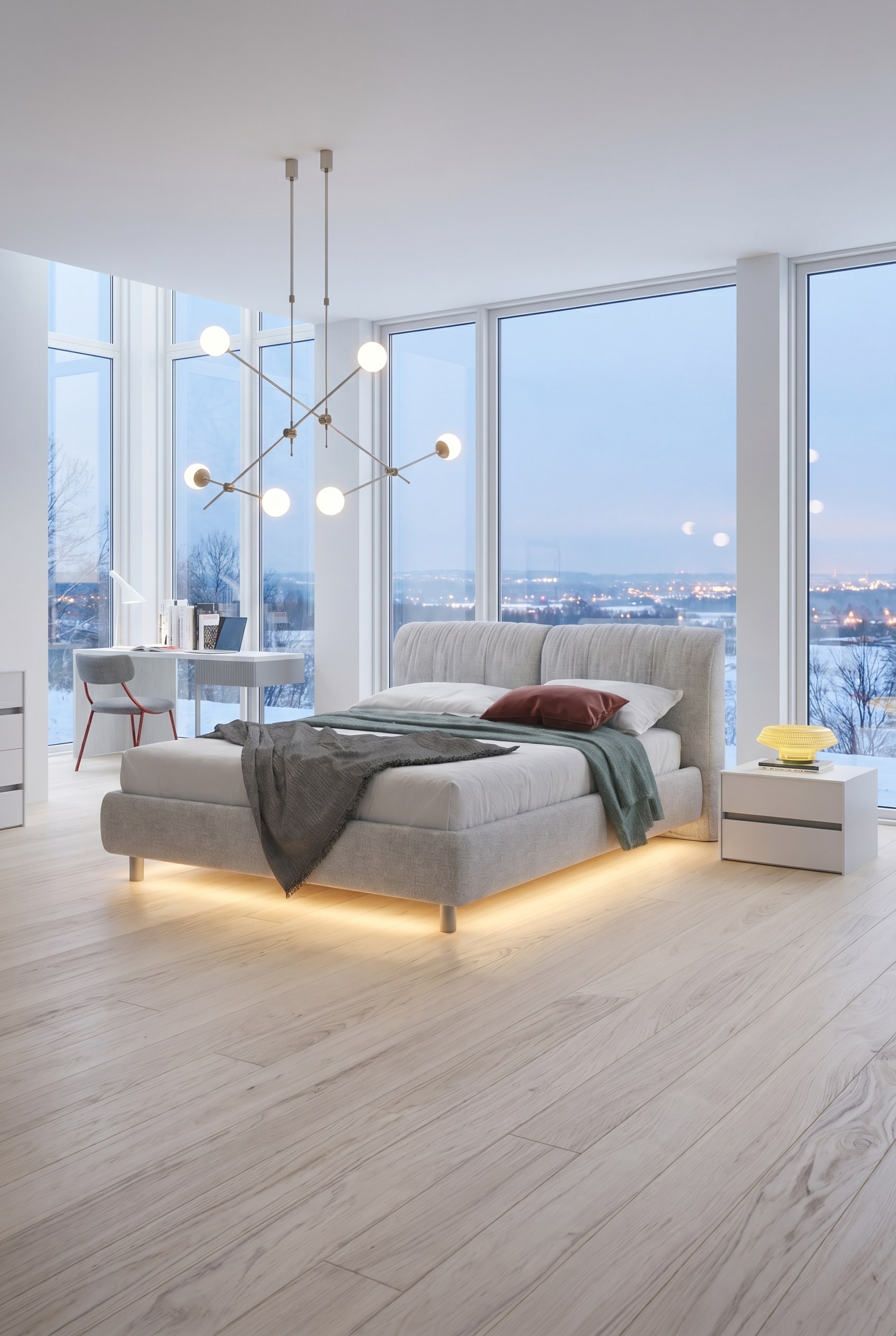 Modernes Schlafzimmer mit hellgrauem Polsterbett, unsichtbarem Bettkasten und mattierten Bodenstrahlern