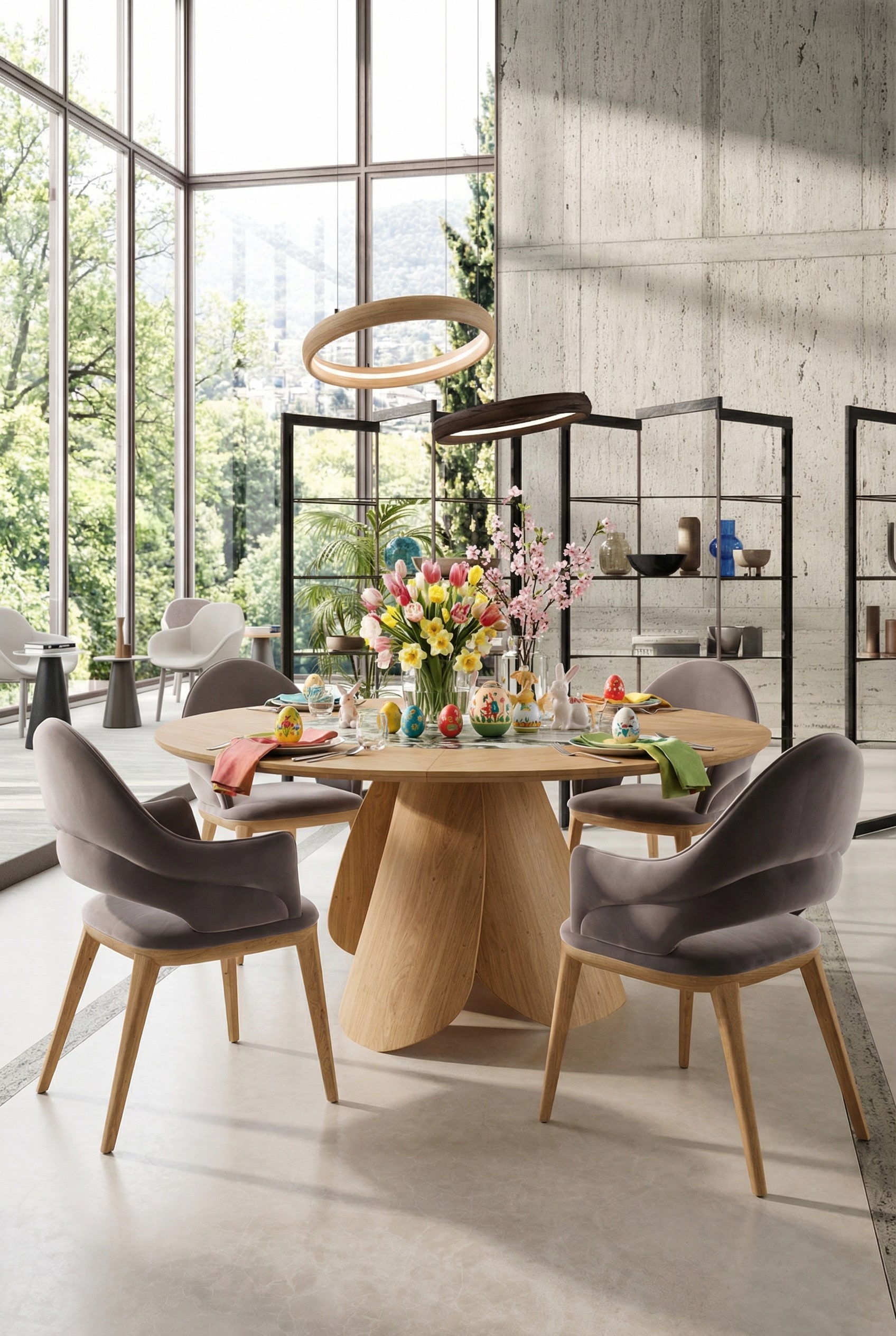 Ozzio Veliero Esstisch rund aus hellem Holz in einem lichtdurchfluteten Architekten-Esszimmer