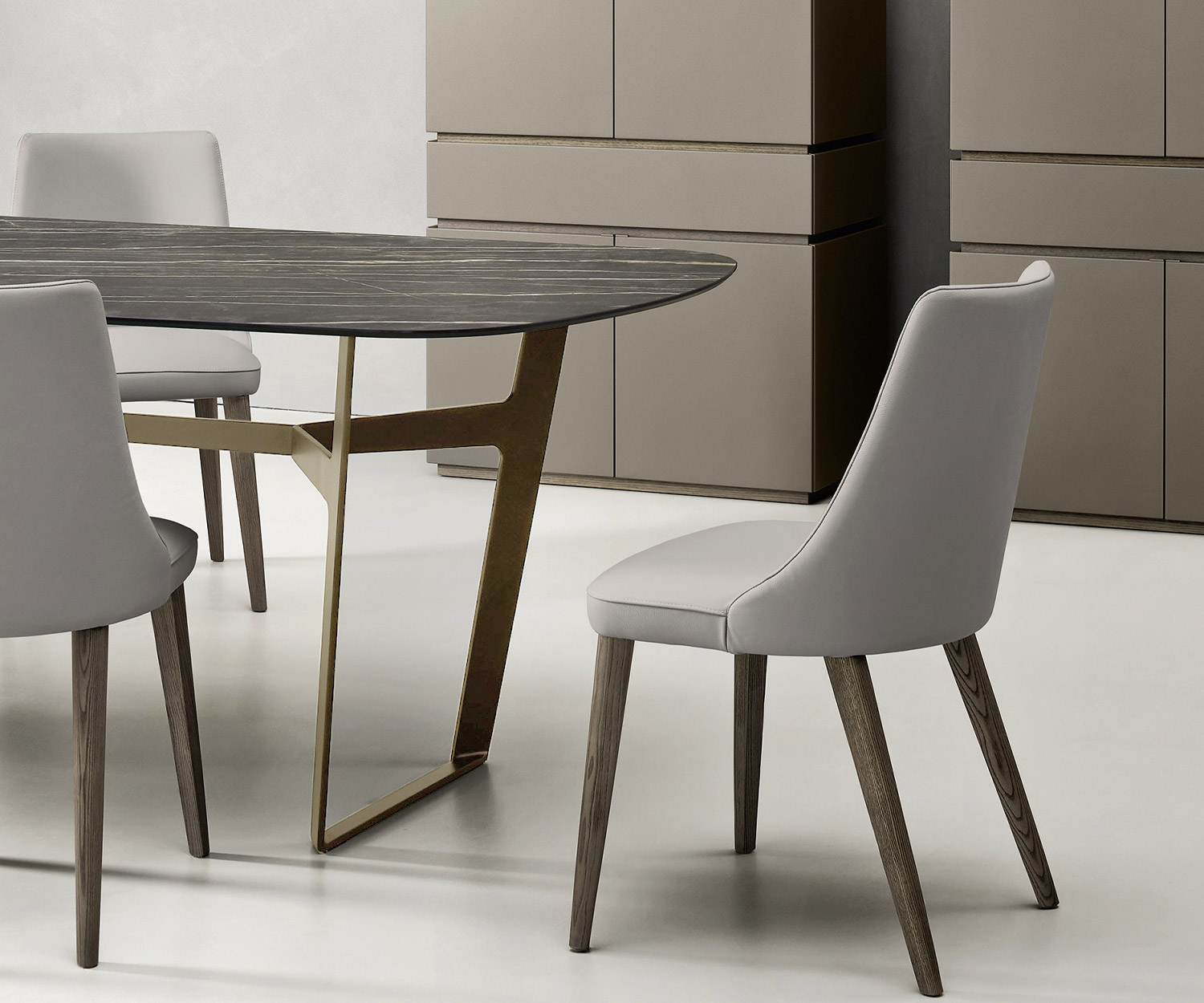 Livitalia Obi designer table in detail metal frame in brown with dining table chairs in front of 2 highboards Livitalia Obi designer table in detail metal frame in brown with dining table chairs in front of 2 highboards