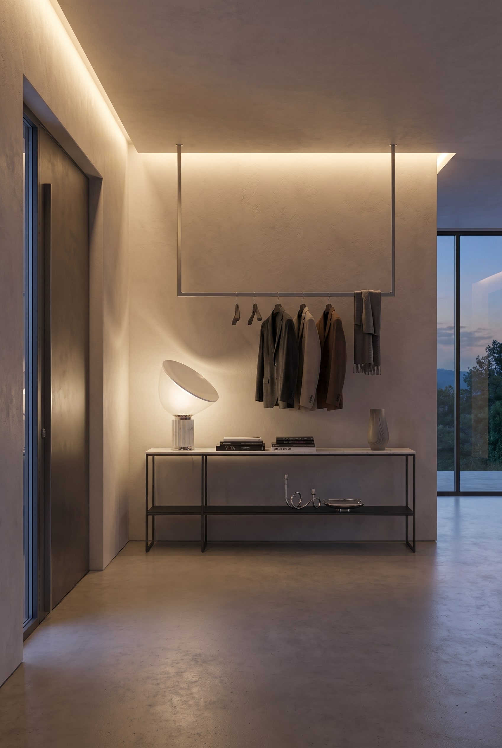 Modern hallway with open wardrobe and a delicate metal console under warm indirect light