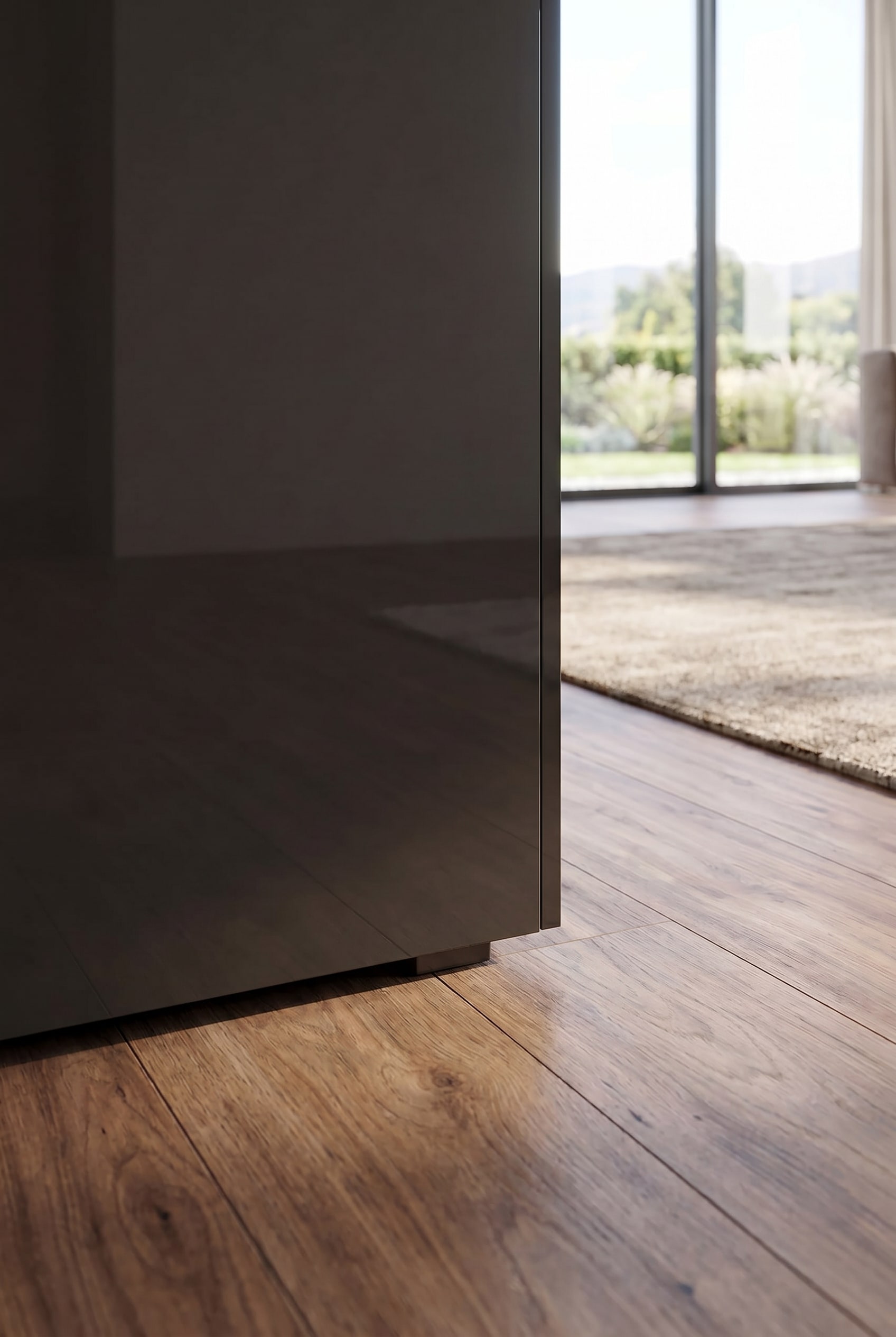 Detailed shot of the subtle plinth feet and the floating appearance of the sideboard