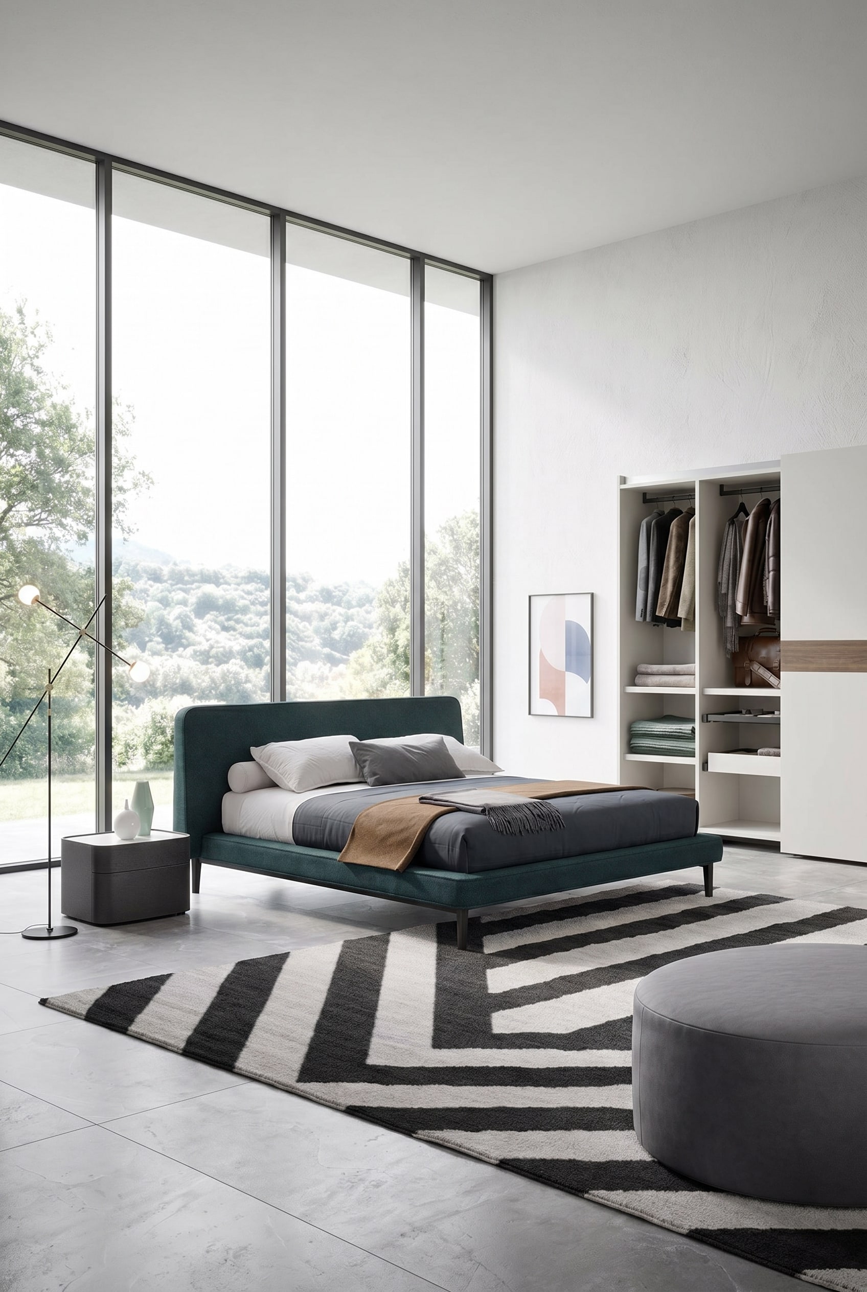 Modernes Schlafzimmer mit minimalistischem Stoffbett in dunklem T&uuml;rkis vor bodentiefen Fenstern mit Blick in die Natur