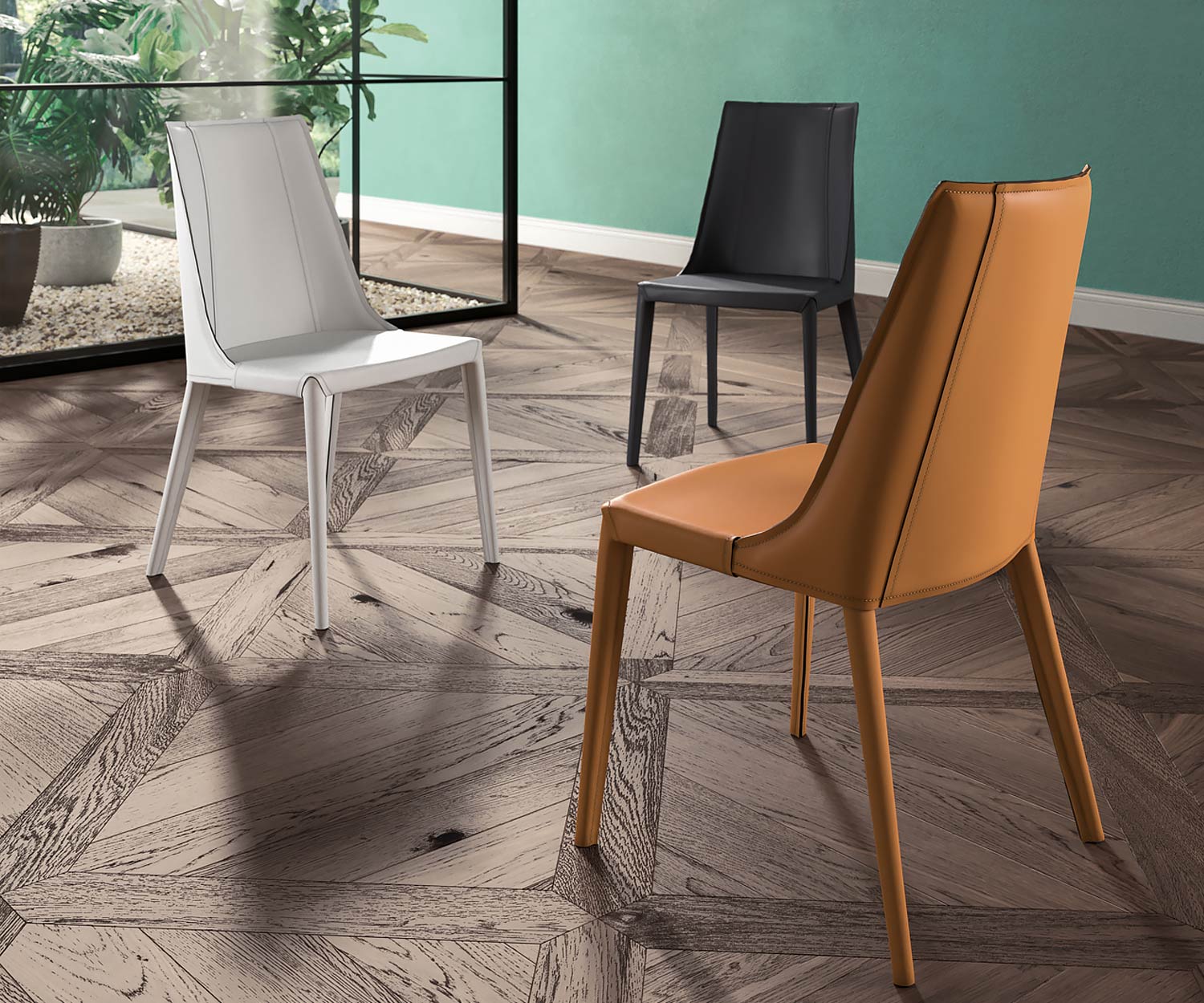 Hochwertiger Design Lederstuhl in den Farben Dunkelgrau Weiß oder Kognac